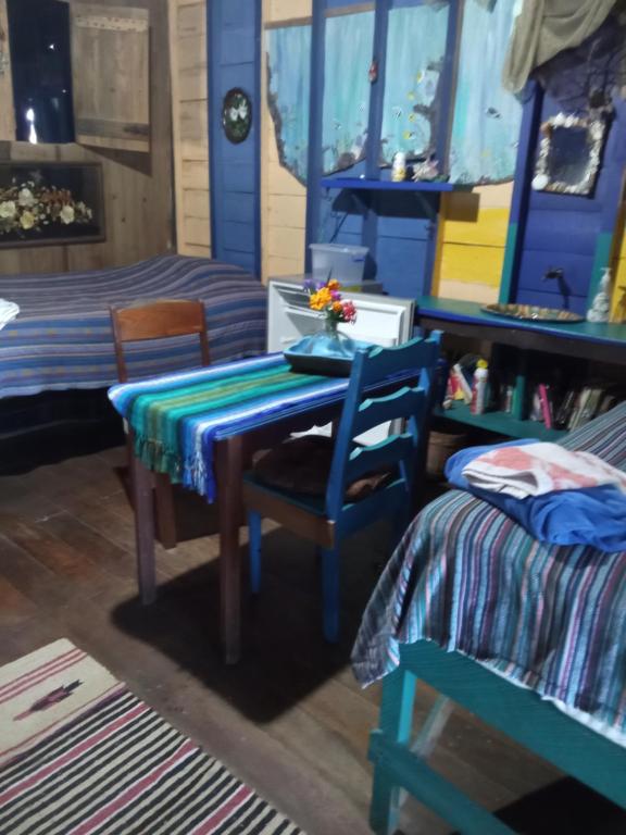 a room with a table and chairs and a bed at Dorm in Hopkins