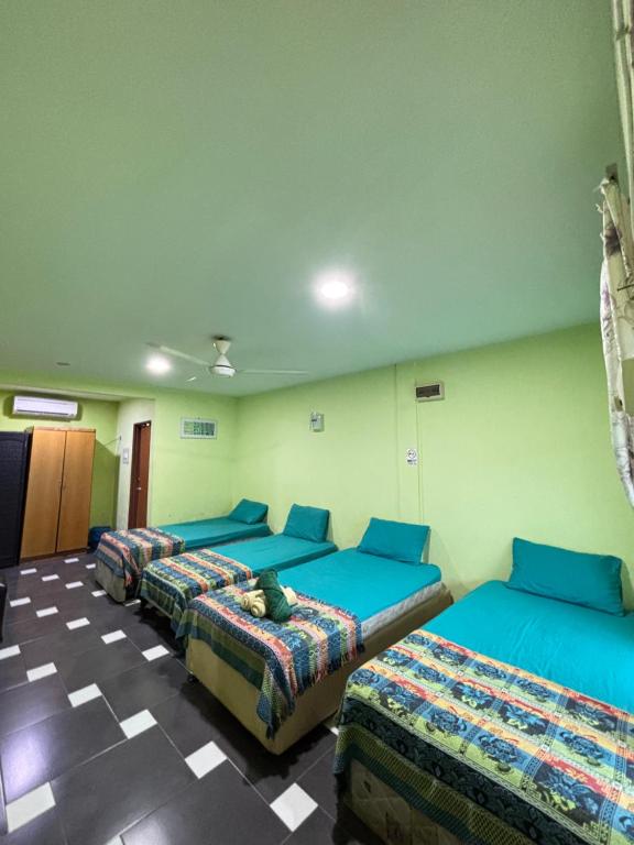 Ayem Homestay UTHM - Chambre Quadruple Économique