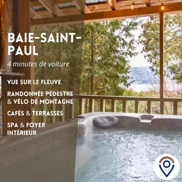 a magazine advertisement for a jacuzzi tub with a view at Rustic chalet with VIEW and SPA in Baie-Saint-Paul