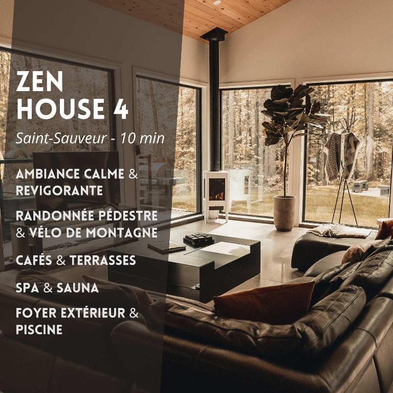 a living room with a couch and a table at Zen House 4 - Villas & Spa in Morin Heights