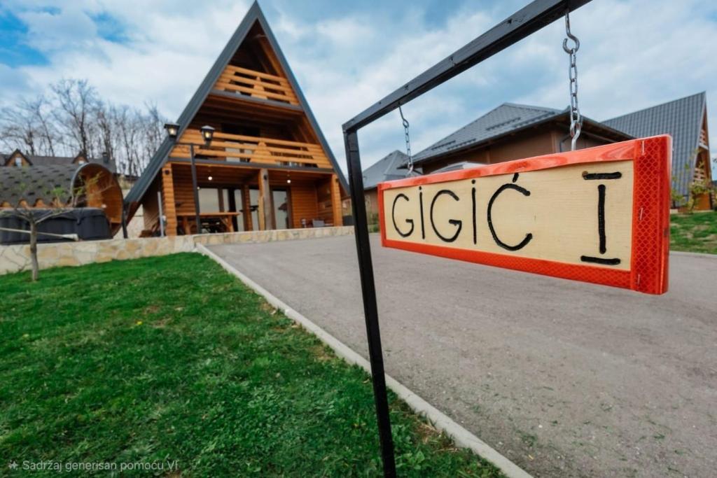 a sign hanging in front of a house at Bungalow&Spa GIGIC I - Whirpool in Brčko