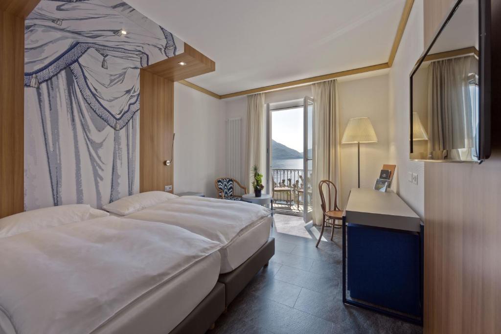 Voodi või voodid majutusasutuse Albergo Carcani by Ketty & Tommy toas