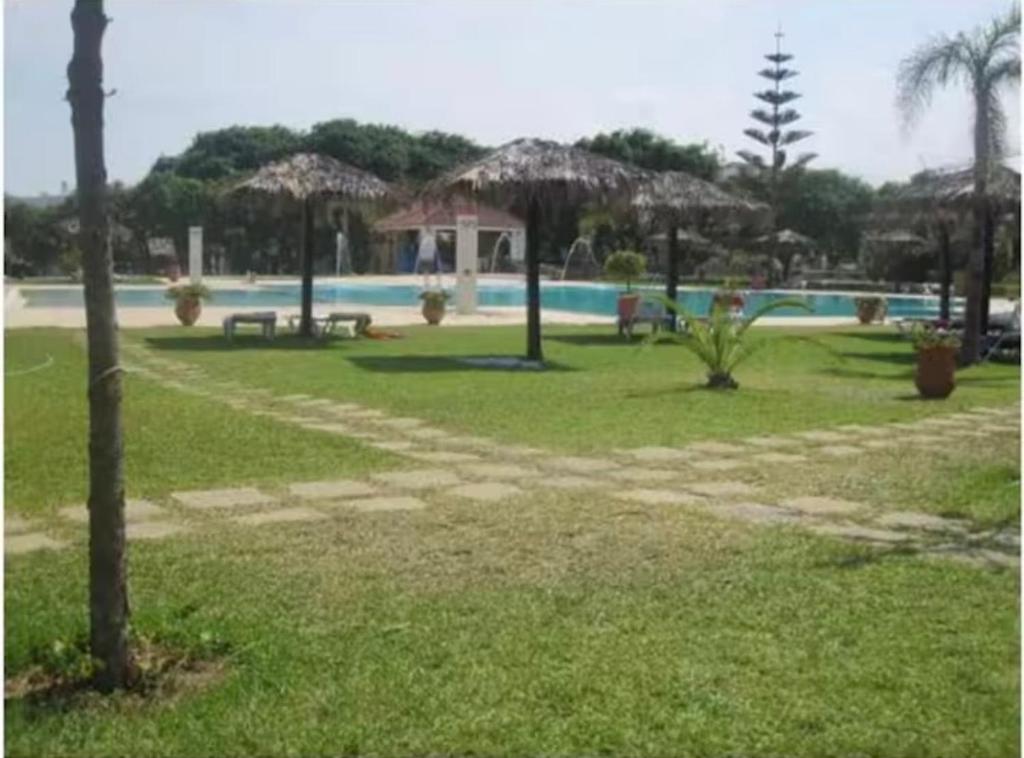 a resort with a swimming pool at Boustan homes in Cabo Negro