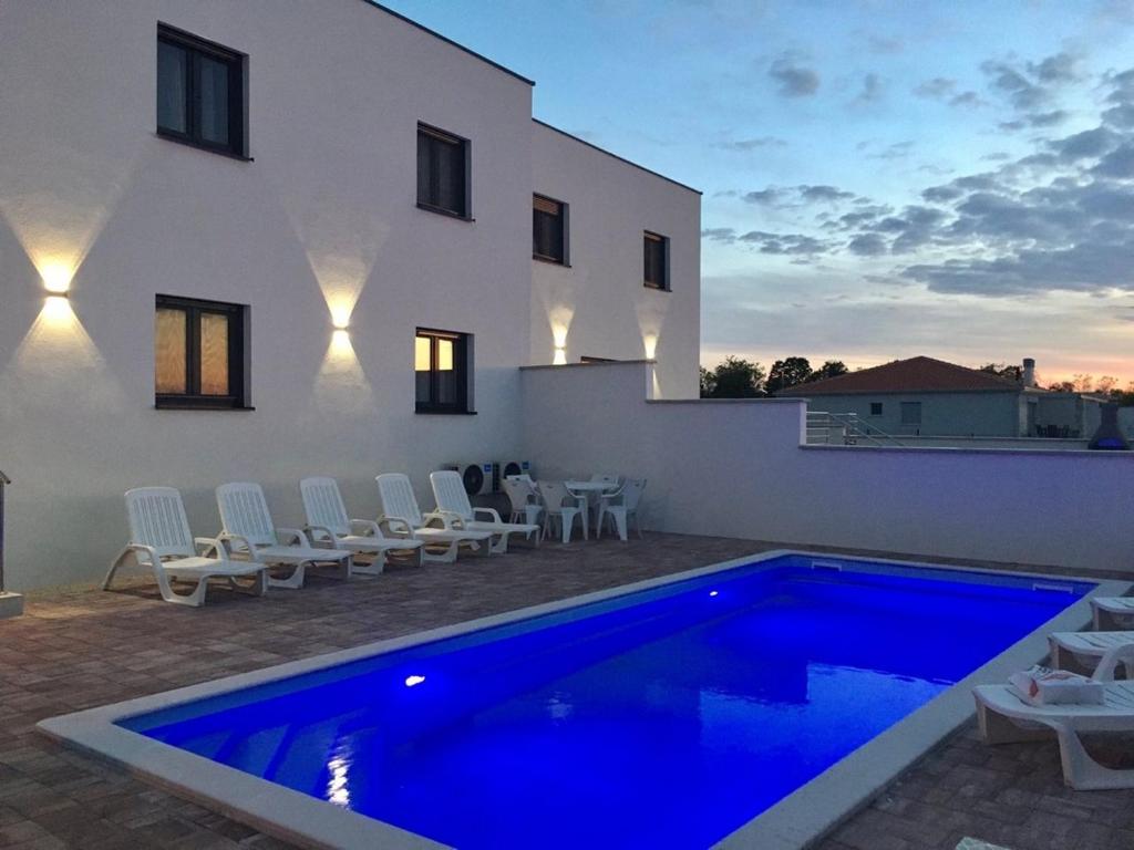 Apartments with swimming pool Murine, Umag - 27509