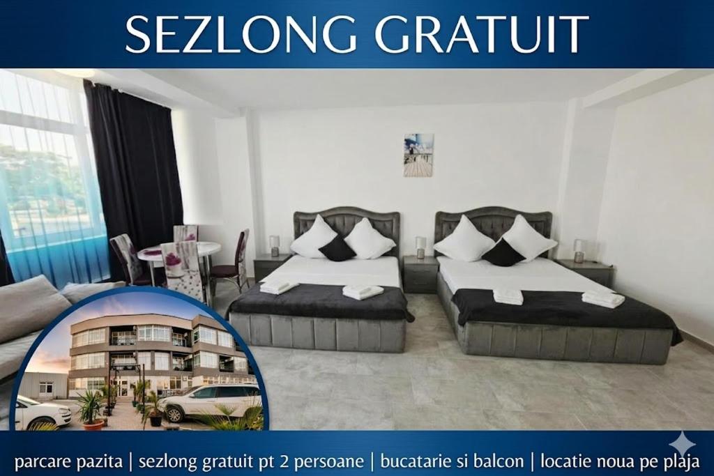 a living room with two beds and a couch at LA PLAYA - Camere pe plaja cu sezlong gratuit in Eforie Nord