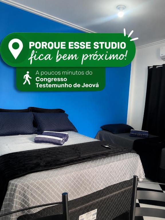 a poster for a hotel room with two beds at Residencial Monteiro Luna in Benevides