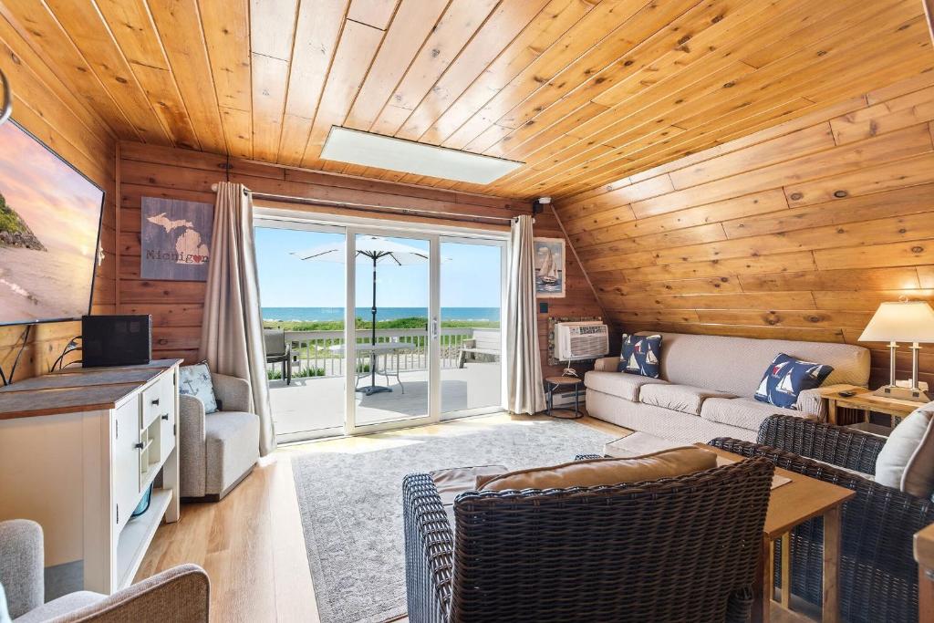 a living room with a couch and a table at Chalet #16 in Stevensville