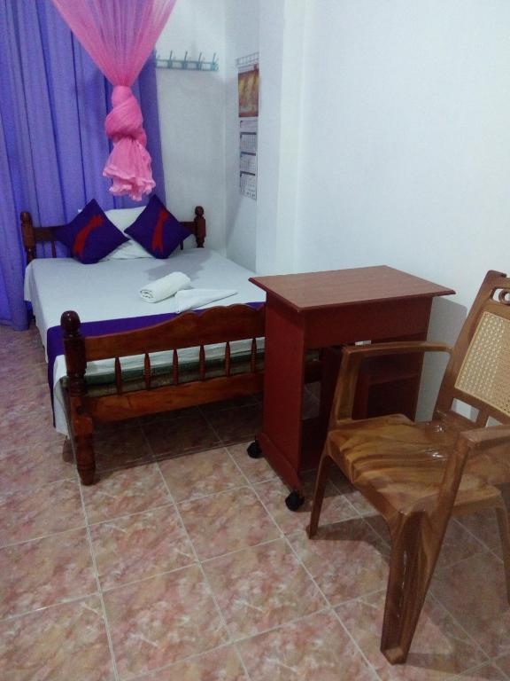 Postel nebo postele na pokoji v ubytování Evening Star Guest Inn