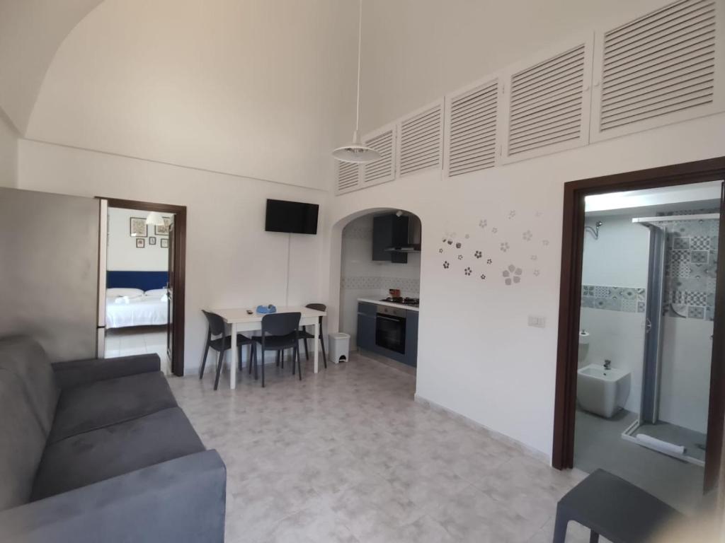 a living room with a couch and a table at Casa Francesca Ponza in Ponza