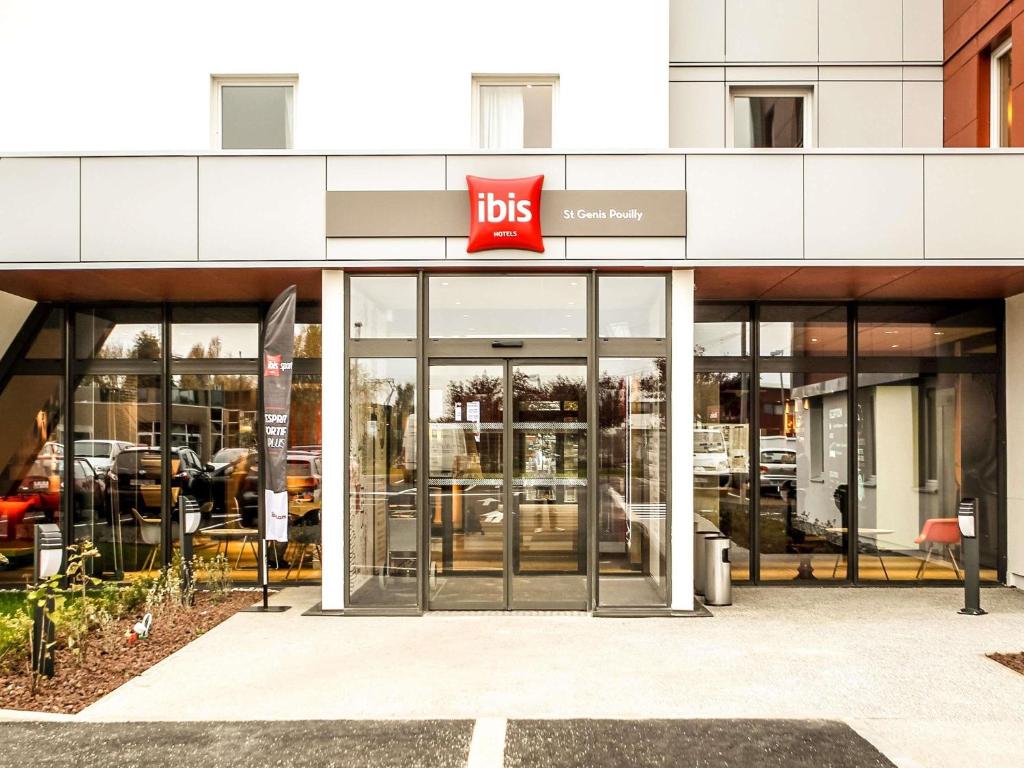 a store front with ahs sign on the door at Ibis Saint-Genis-Pouilly Genève in Saint-Genis-Pouilly