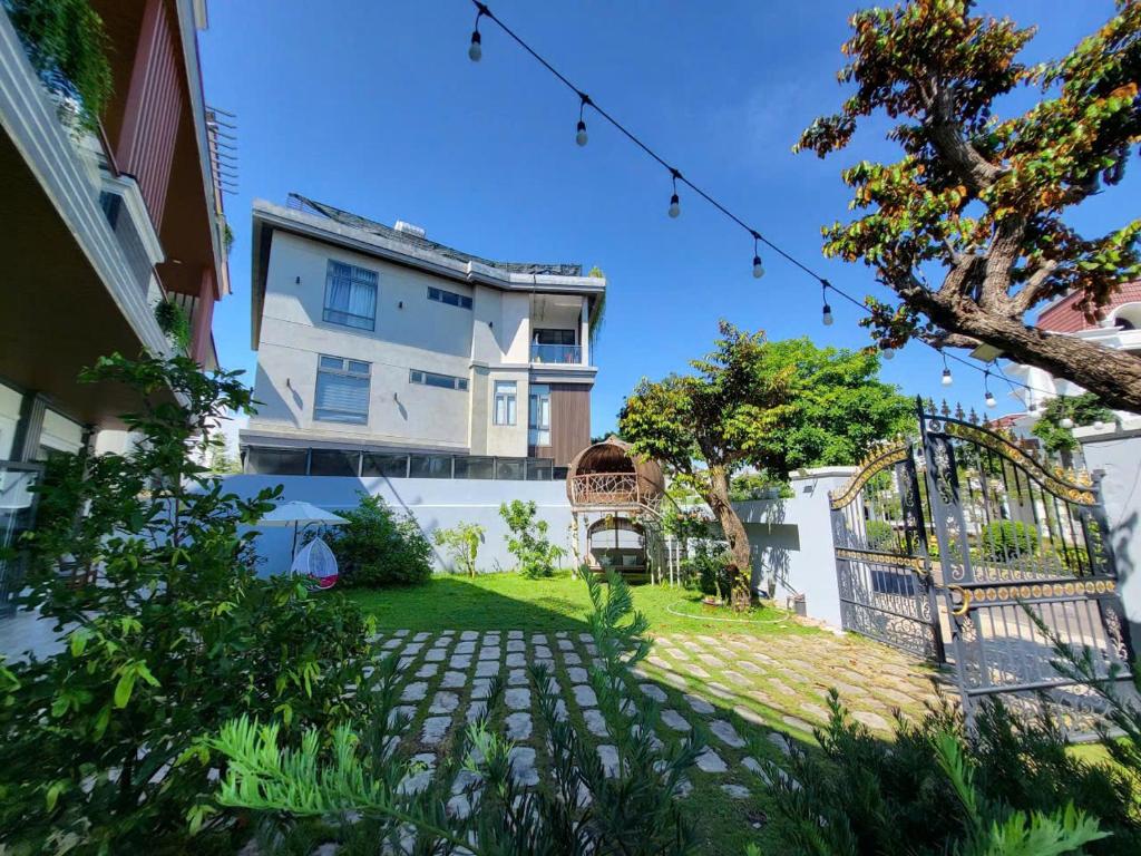 a view of a house from the garden at Arden Villa Quy Nhơn in Quy Nhon