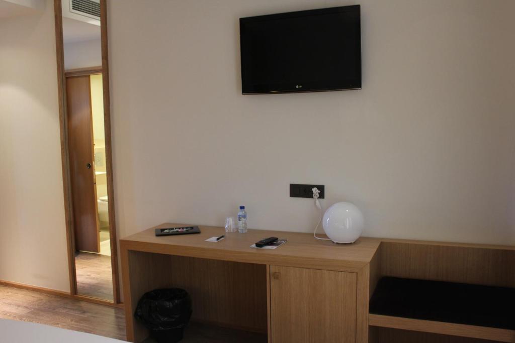 TV a/nebo společenská místnost v ubytování Hotel Araba