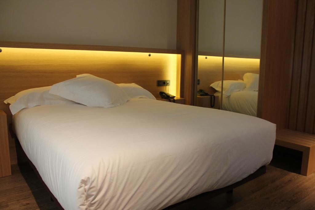Postel nebo postele na pokoji v ubytování Hotel Araba