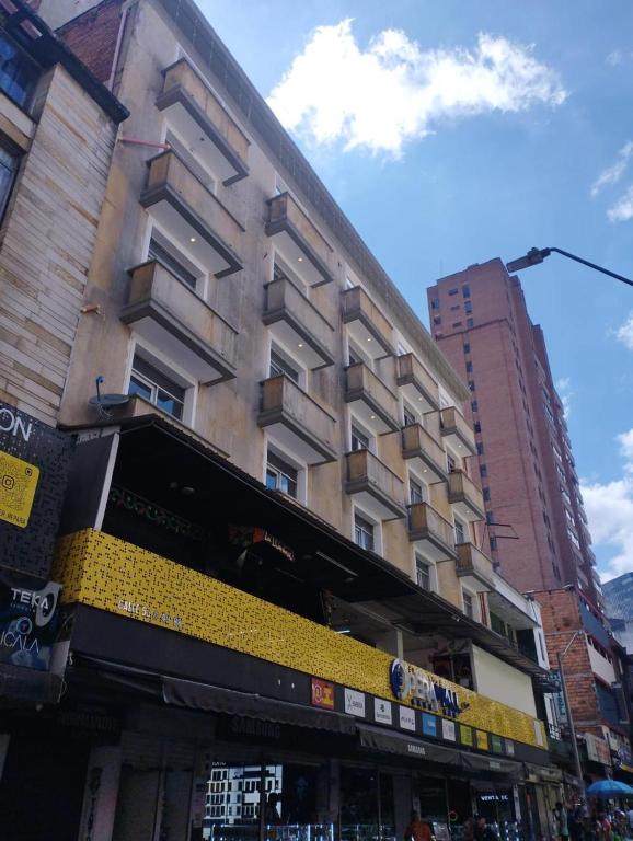 a building on a city street with a building at Mejor Hotel, Centro Medellín, Opera, adults only entertainment in Medellín
