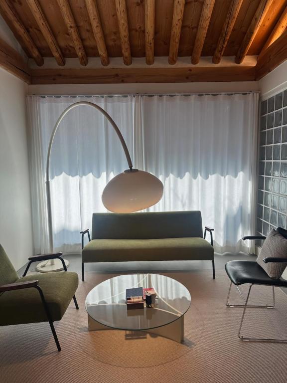 a living room with a couch and a coffee table at Stay Jian in Daegu