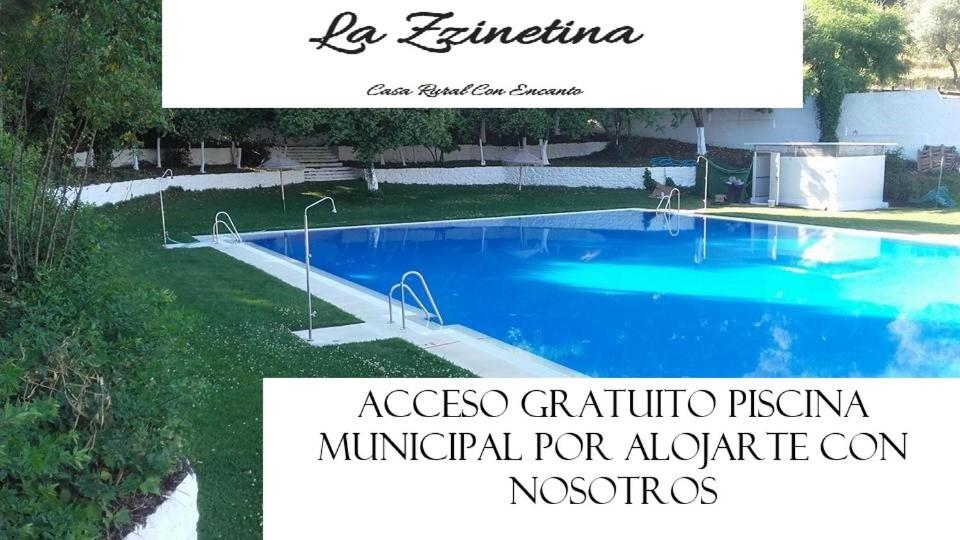a picture of a swimming pool in a yard at Casa Rural La Zzinetina con Jacuzzi in Constantina