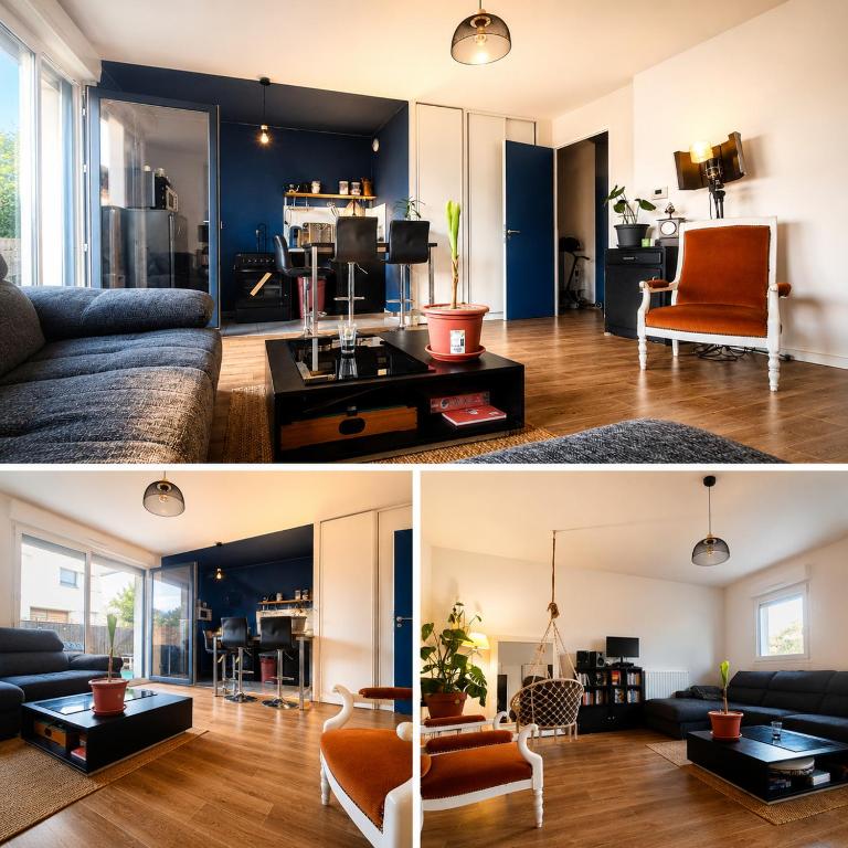 a living room with a couch and a table at Appart Cosy 65m3 in Nantes