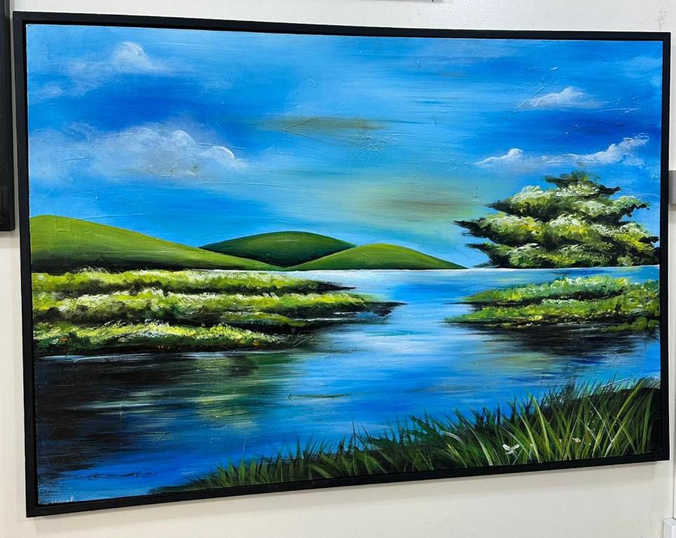 a painting of a river with trees and grass at INTAGARA Handcrafts in Butare