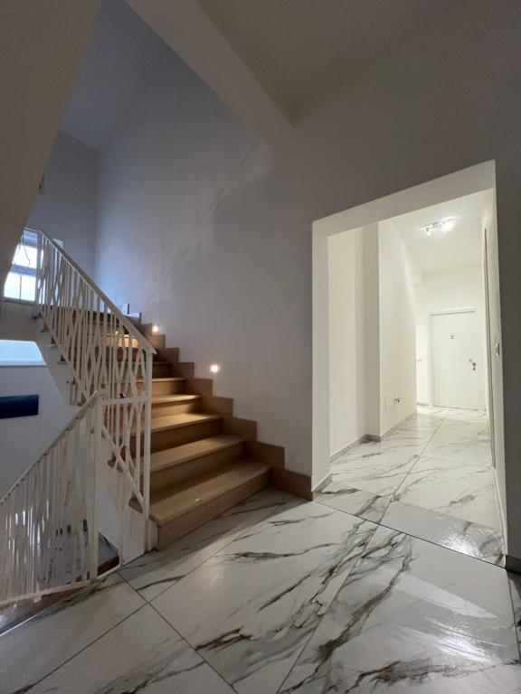 an empty hallway with stairs in a house at Corte Moscara Vasto Centro in Vasto