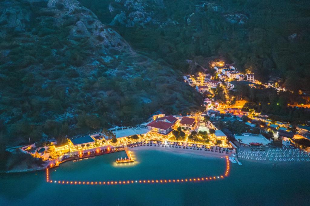 an aerial view of a resort at night at Hotel Meri All inclusive in Oludeniz