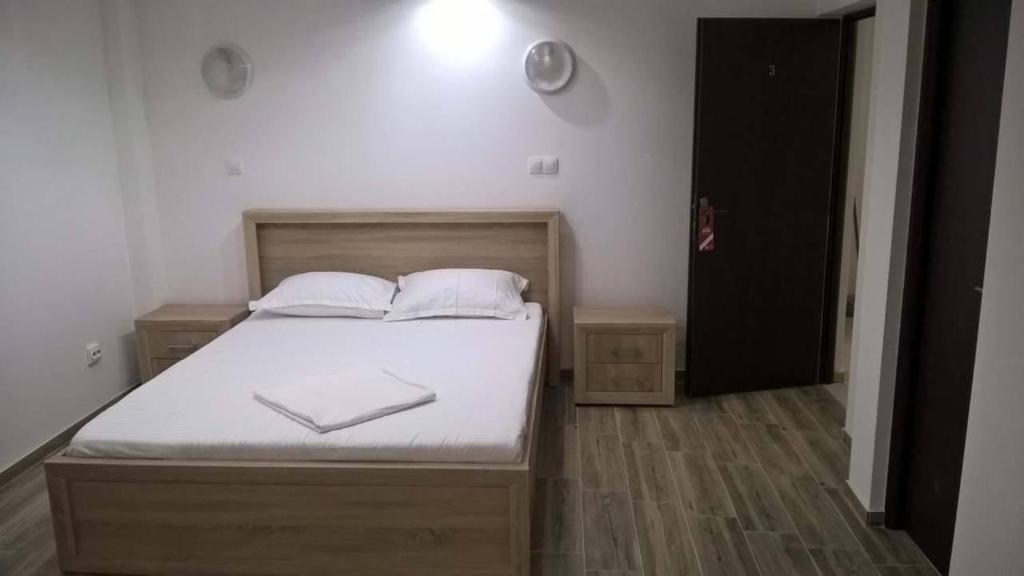 Postel nebo postele na pokoji v ubytování Vila Hercules