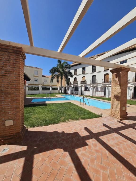a shadow of a building with a swimming pool at Casa Velez in Vélez de Benaudalla