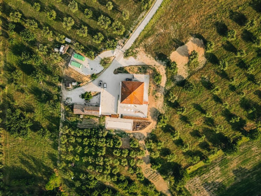 an overhead view of a house with an orange roof at Ritrovare Country House in Citta' Sant'Angelo