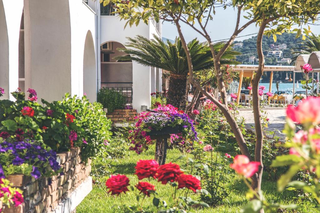 A garden outside Iliada Beach Hotel