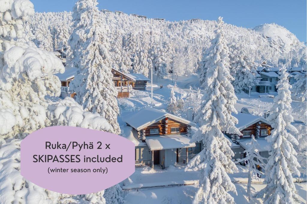 a cabin in the snow with snow covered trees at Rinneköngäs - Ruka-Pyhä 2x SKIPASS included - Free Skibuss Doorstep - Renovated in Ruka