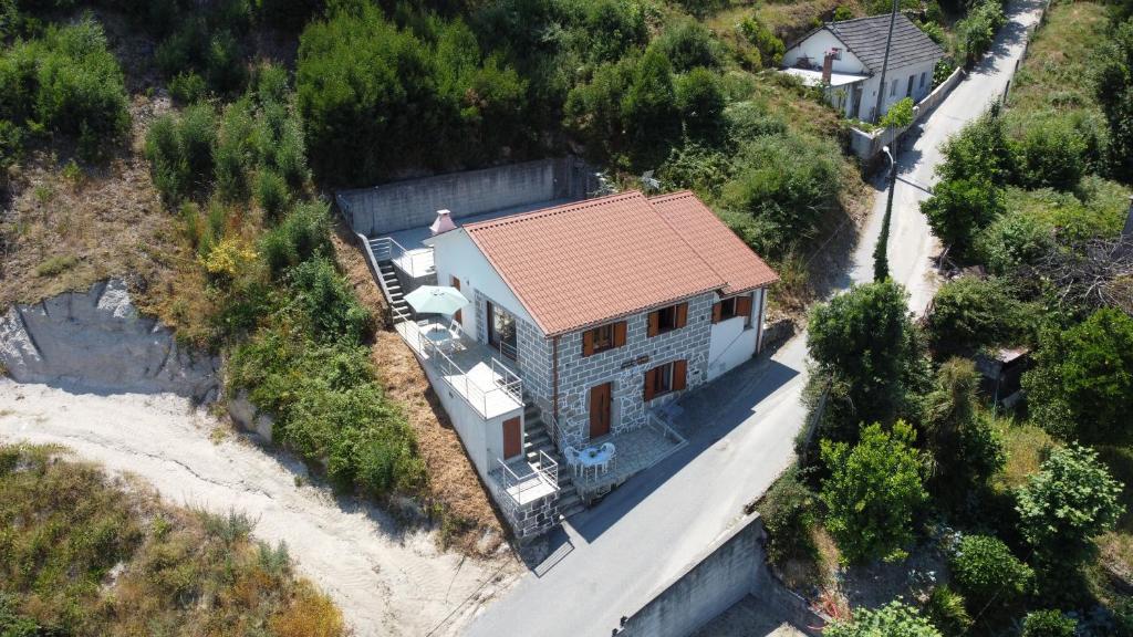 an aerial view of a house on the beach at Casa da Carvalha Mona in Rio Caldo