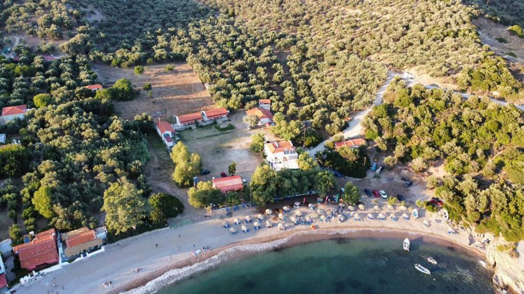 an aerial view of a beach with a group of umbrellas at LYGIROS ANASTASIOS in Tarti