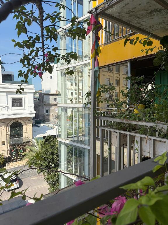 a balcony with a view of a city at Chillax in Ha Long