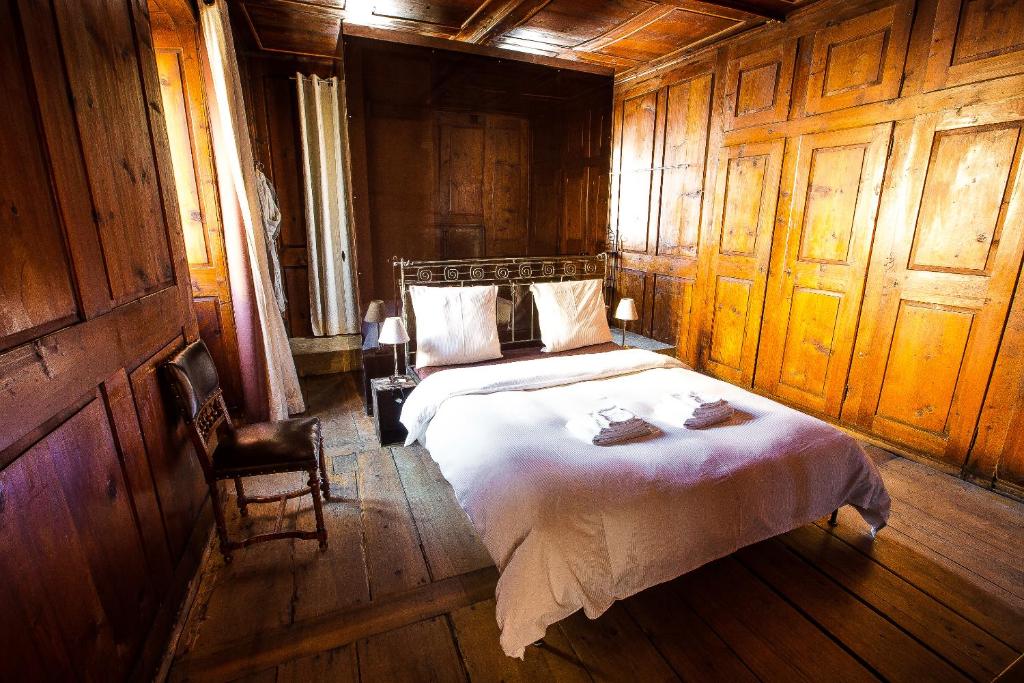 Postel nebo postele na pokoji v ubytování La Grande Maison