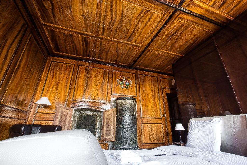 Postel nebo postele na pokoji v ubytování La Grande Maison