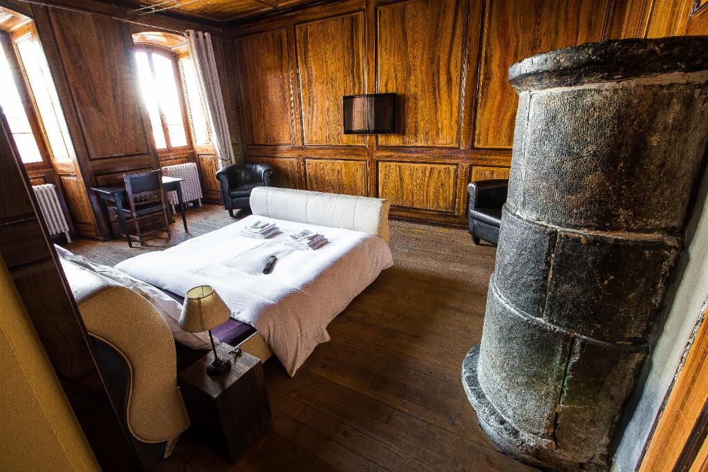 Postel nebo postele na pokoji v ubytování La Grande Maison