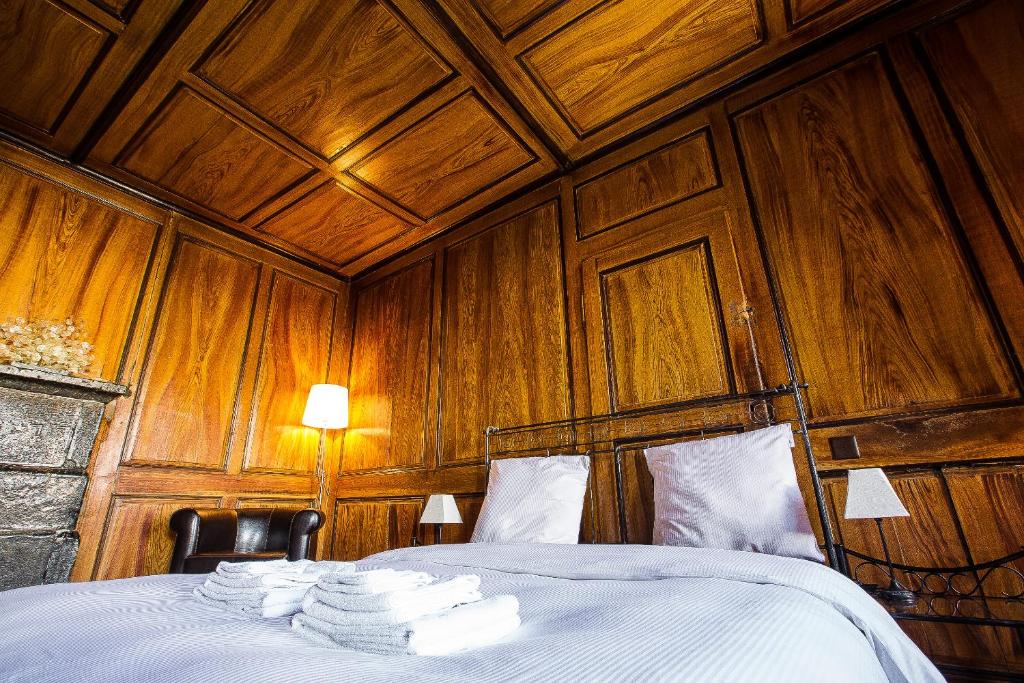 Postel nebo postele na pokoji v ubytování La Grande Maison