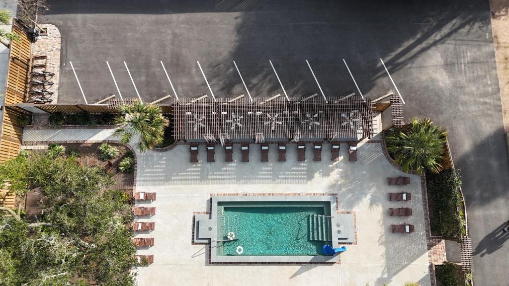 an overhead view of a swimming pool on a patio at The Mansard House in Galveston