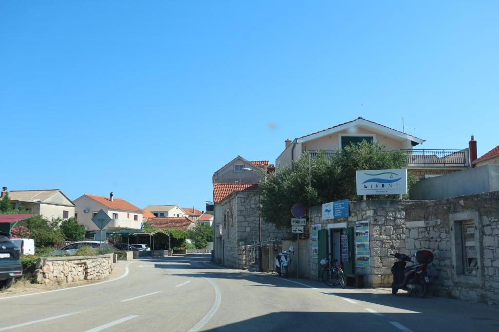 a building on the side of a street at Kalelarga in Betina