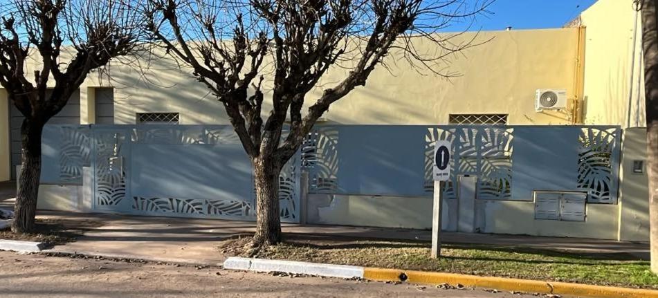 a wall with a mural of zebras on it at Casona Villa General Savio in Villa General Savio