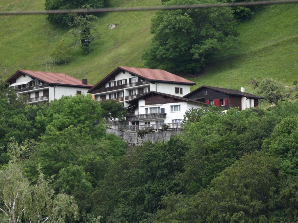 a group of houses on the side of a hill at Modern Apartment in Mastrils near Forest in Mastrils