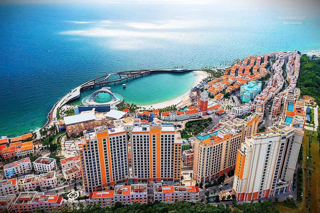 an aerial view of a city with a beach at ELIO PHÚ QUỐC - Hillside Residence in Phú Quốc