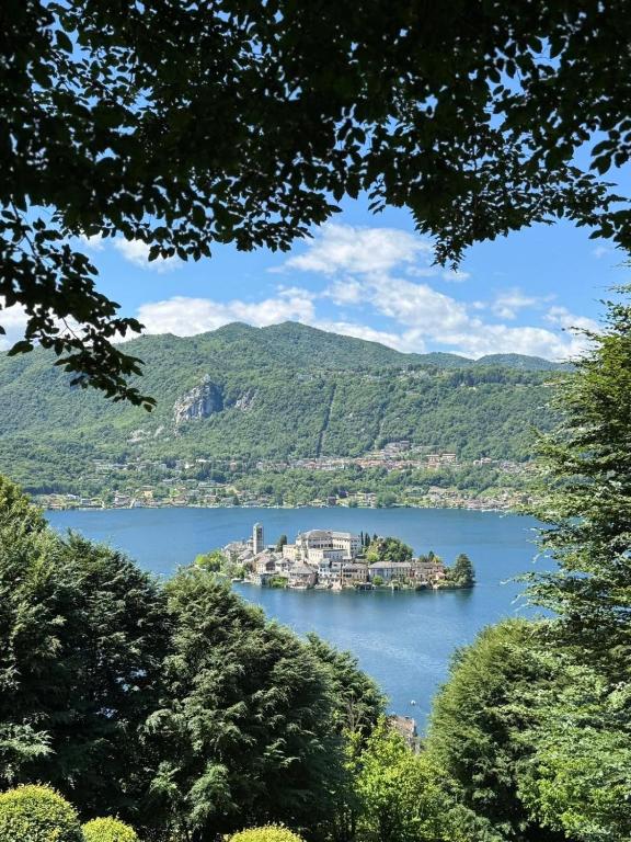 a large island in the middle of a lake at Jblago in Arona