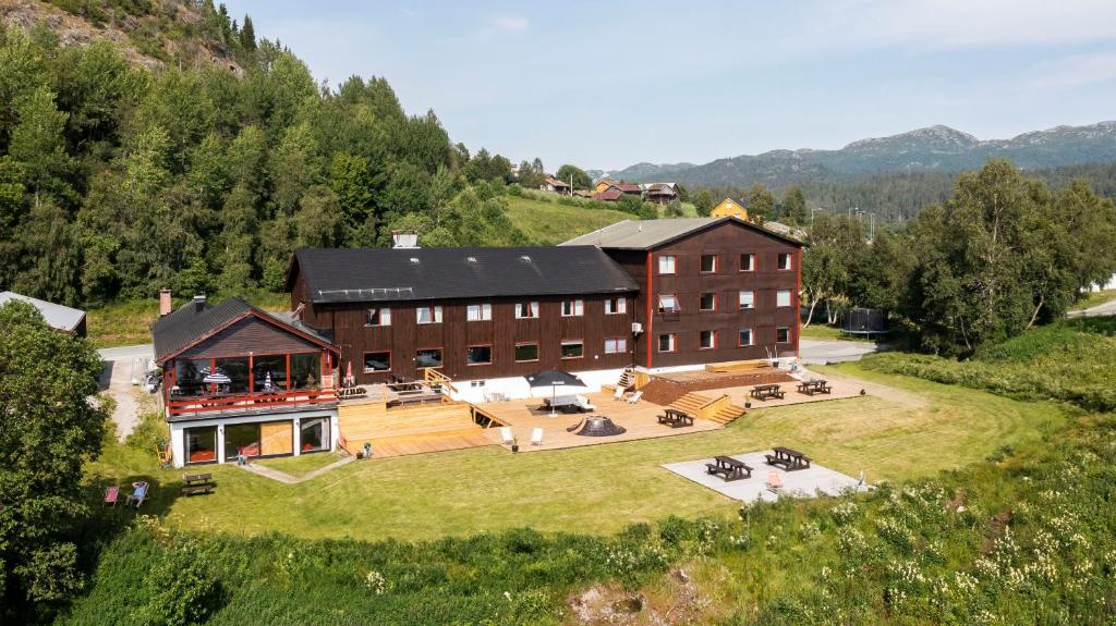 an aerial view of a large building on a hill at Austbø Hotell in Rauland