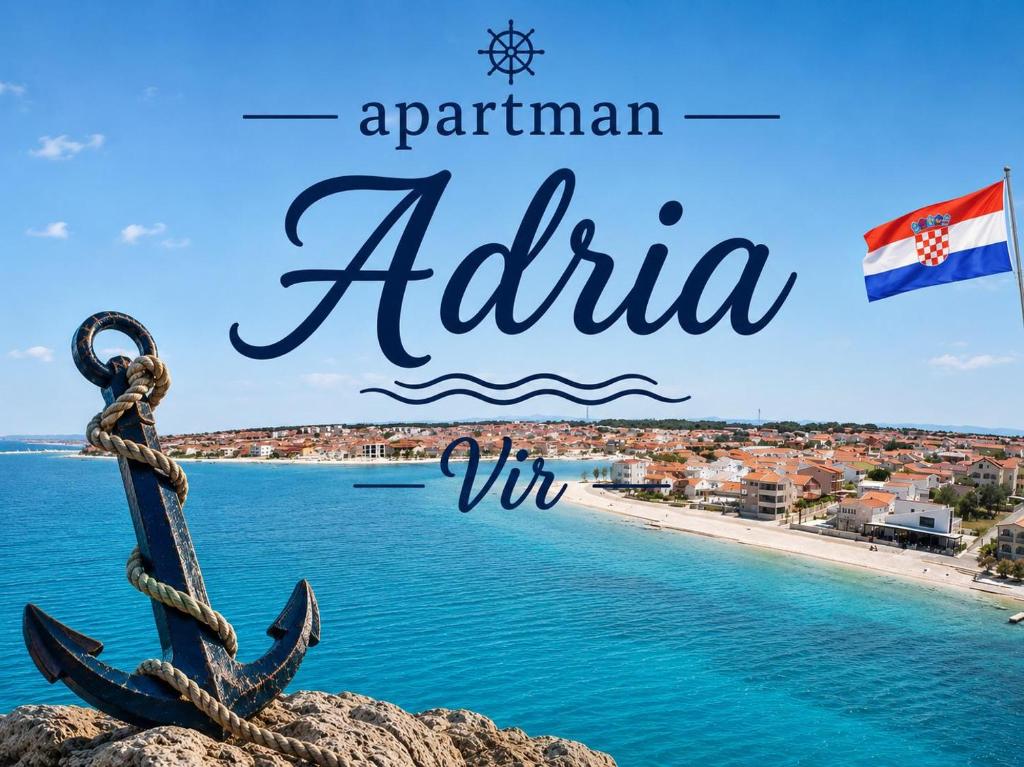 an image of an anchor on a rock next to a beach at Apartments Adria in Vir