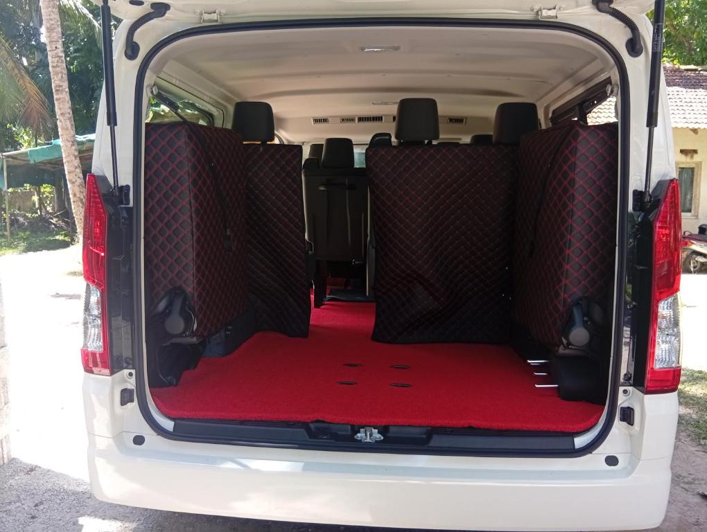 a white van with the back seats down at Serendib sapphire tours in Kosgoda