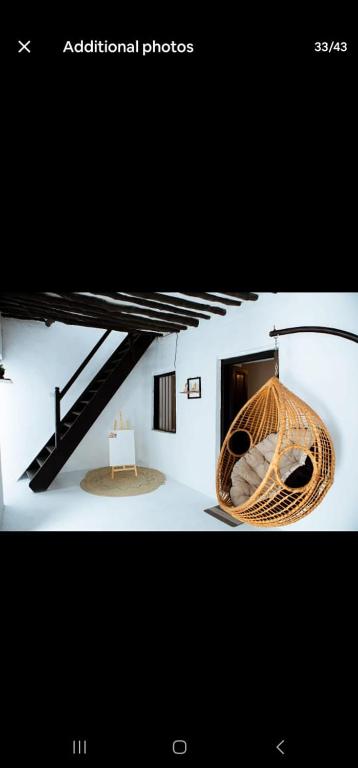 a picture of a room with a bed in it at The courtyard Zanzibar in Ngambo