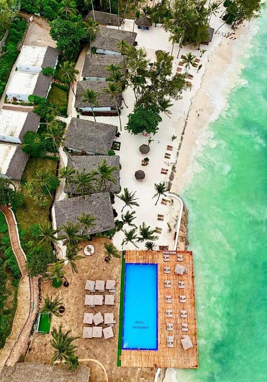 an aerial view of a resort with a swimming pool at Royal Mandarin Hotel & Resort Zanzibar in Pwani Mchangani