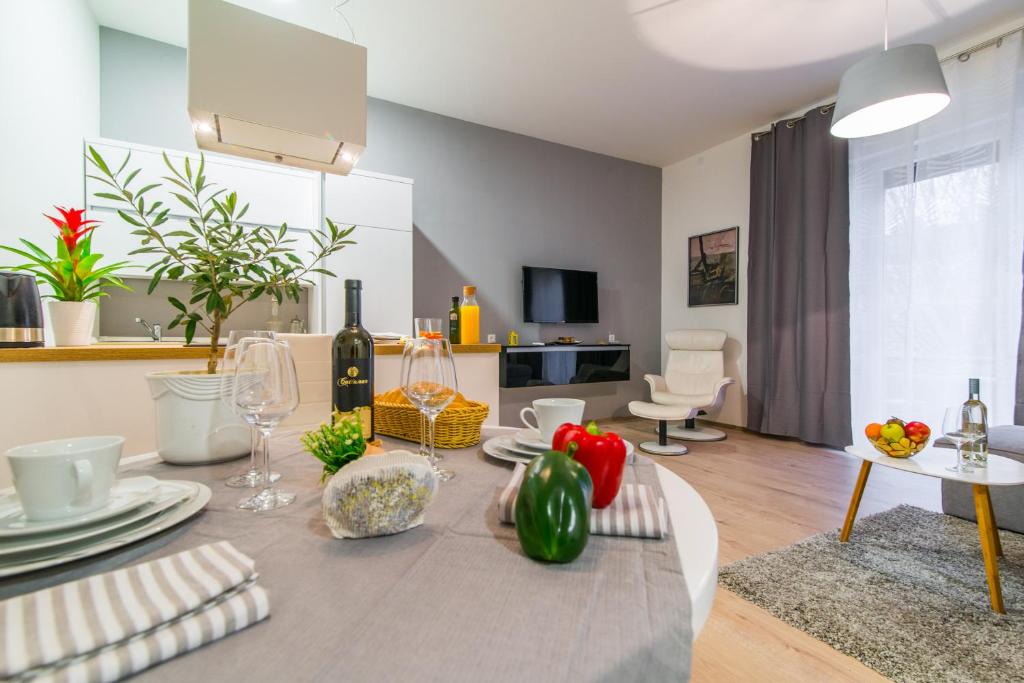 TV a/nebo společenská místnost v ubytování Polai Center Apartments