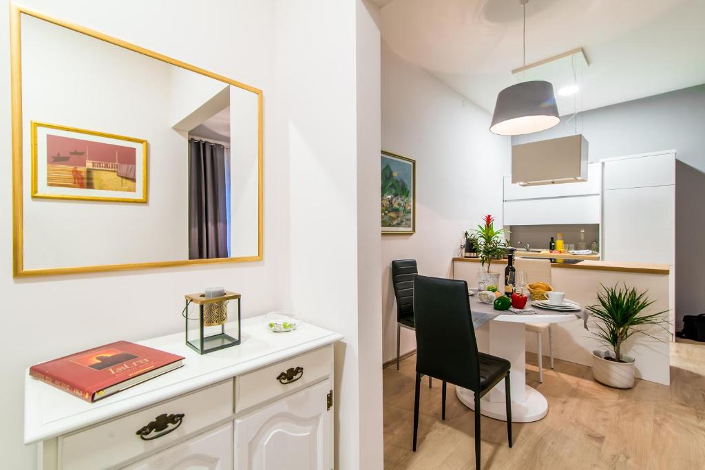 Kuchyň nebo kuchyňský kout v ubytování Polai Center Apartments