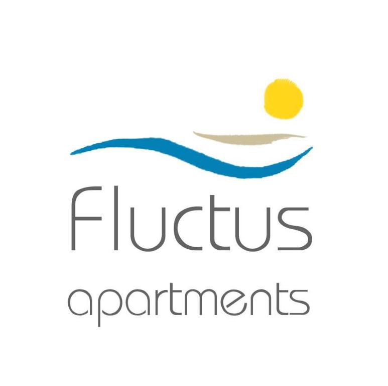 a logo for a swimmer with a ball in the water at Fluctus Apartments in Brodarica